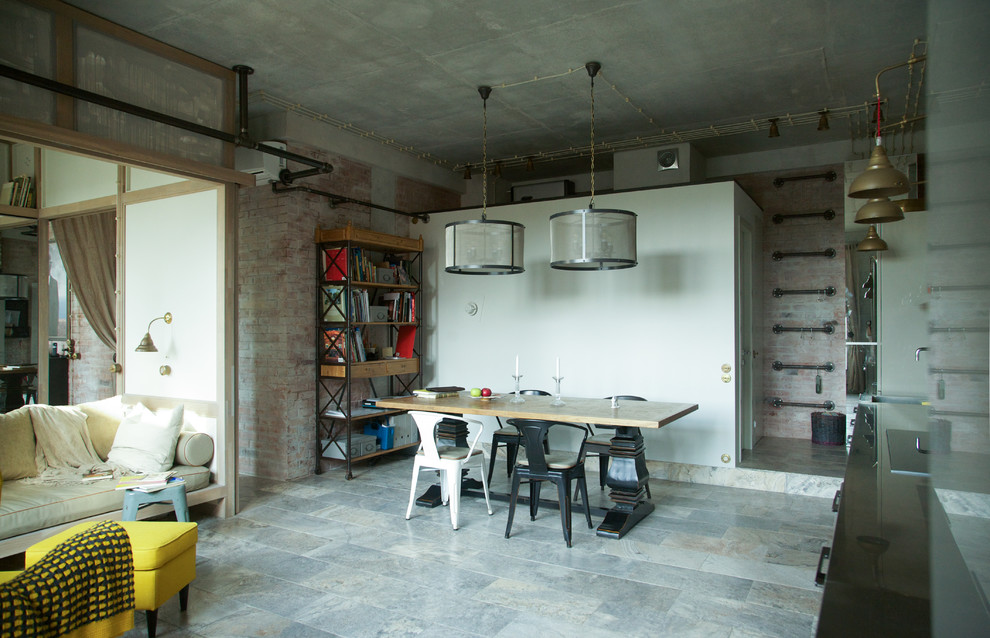 Источник вдохновения для домашнего уюта: гостиная-столовая в стиле лофт с серыми стенами