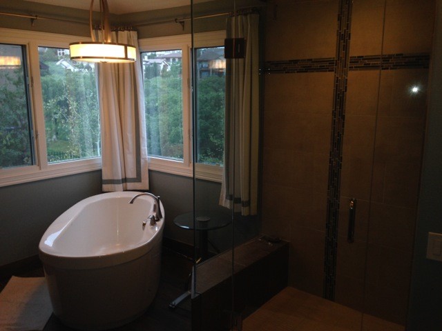 Example of a mid-sized transitional master beige tile and porcelain tile porcelain tile home design design in Denver with gray walls