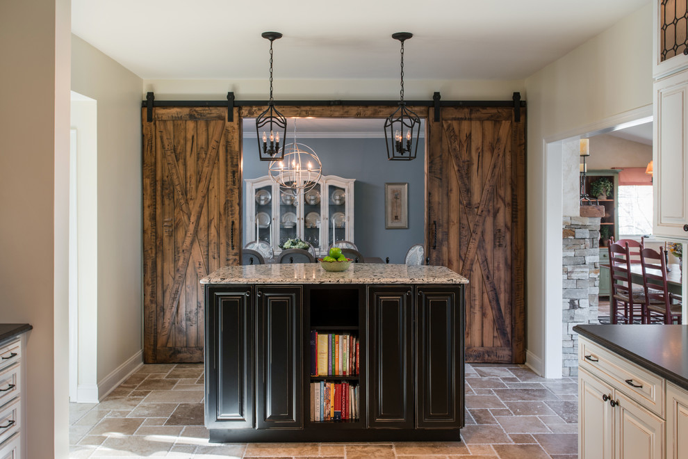 Mid-sized elegant u-shaped travertine floor and multicolored floor enclosed kitchen photo in Wilmington with a farmhouse sink, raised-panel cabinets, distressed cabinets, quartz countertops, white backsplash, ceramic backsplash, stainless steel appliances and two islands