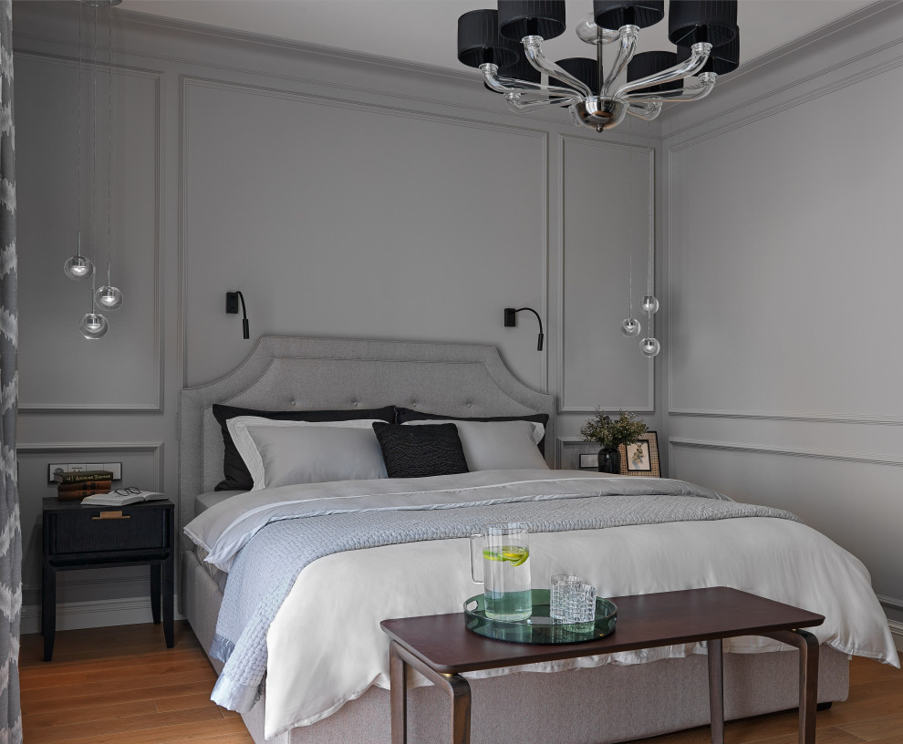 Inspiration for a transitional master bedroom in Moscow with grey walls, medium hardwood floors and brown floor.