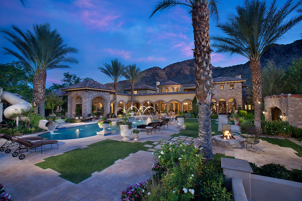 Tuscan backyard rectangular water slide photo in Phoenix