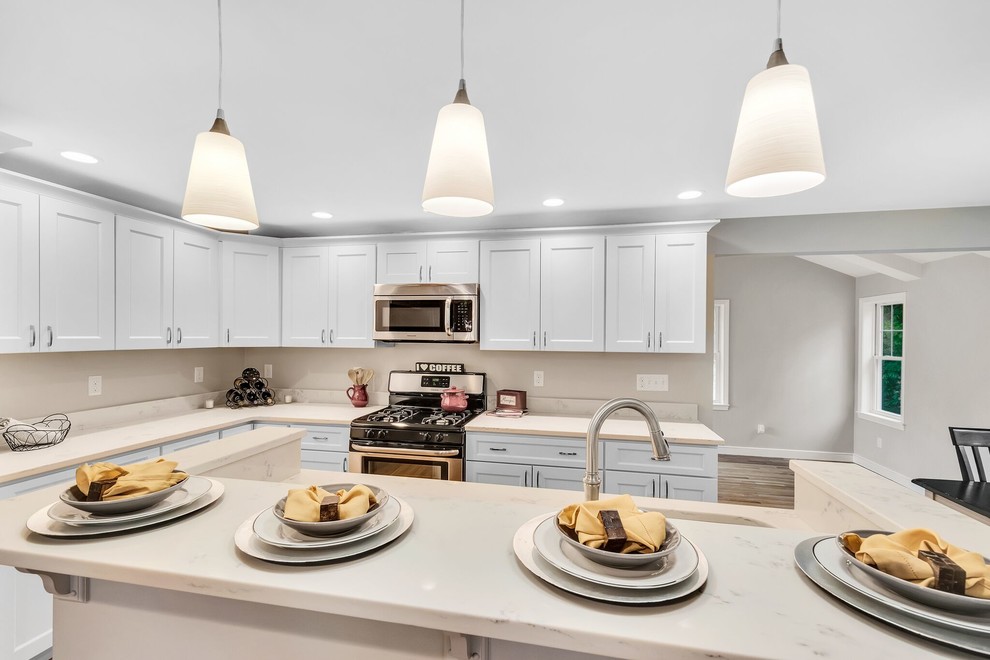 Example of a transitional kitchen design in Boston