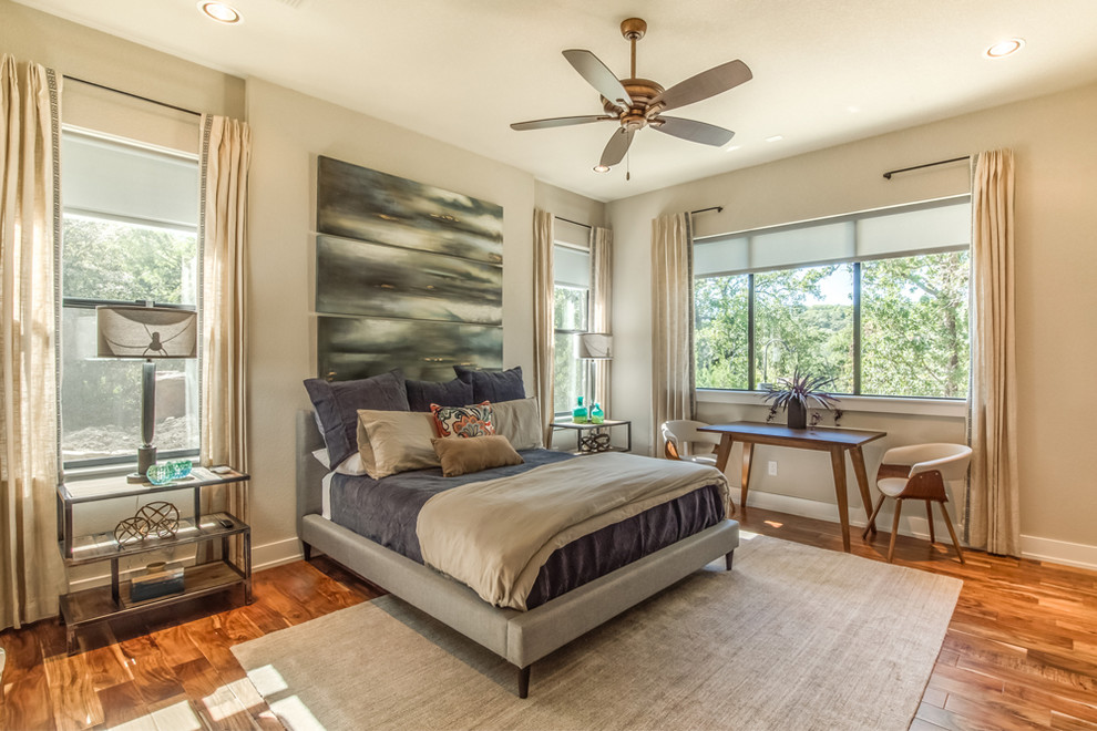 Transitional master bedroom in Dallas with beige walls, medium hardwood floors and brown floor.