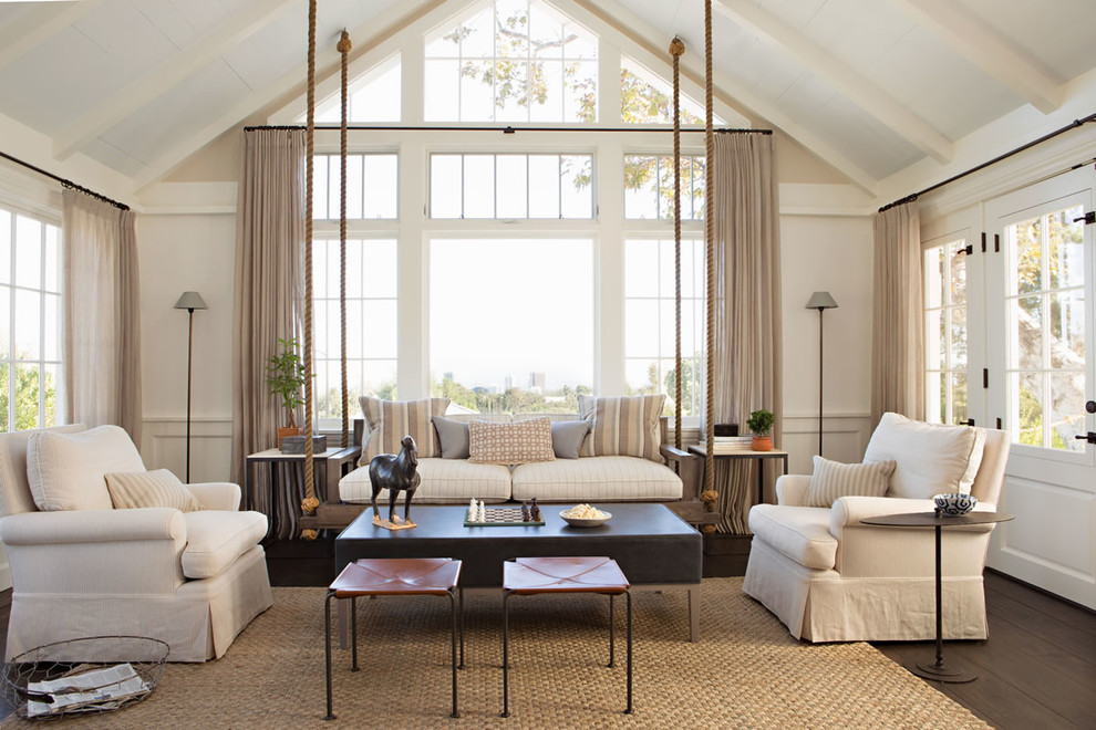 Design ideas for a large beach style formal enclosed living room in San Francisco with white walls, dark hardwood floors, no fireplace, no tv and brown floor.