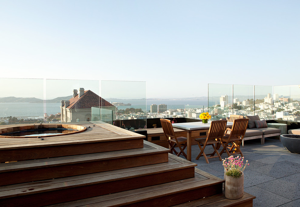 Design ideas for a contemporary rooftop and rooftop deck in San Francisco with no cover and glass railing.