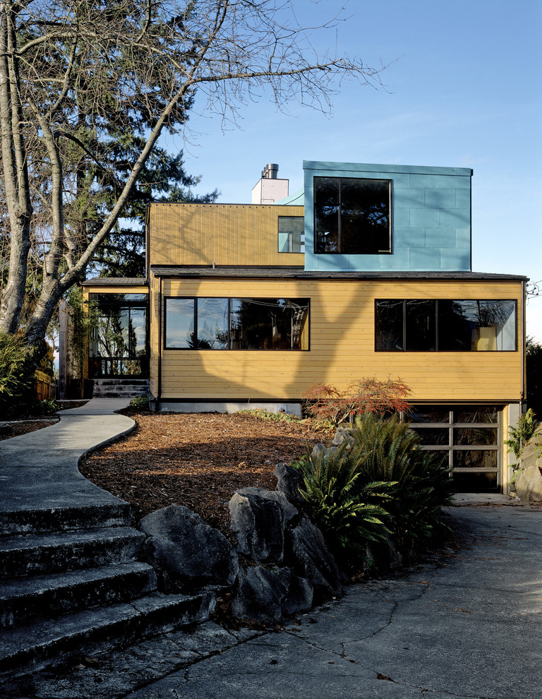 Inspiration for a contemporary two-storey exterior in Seattle.