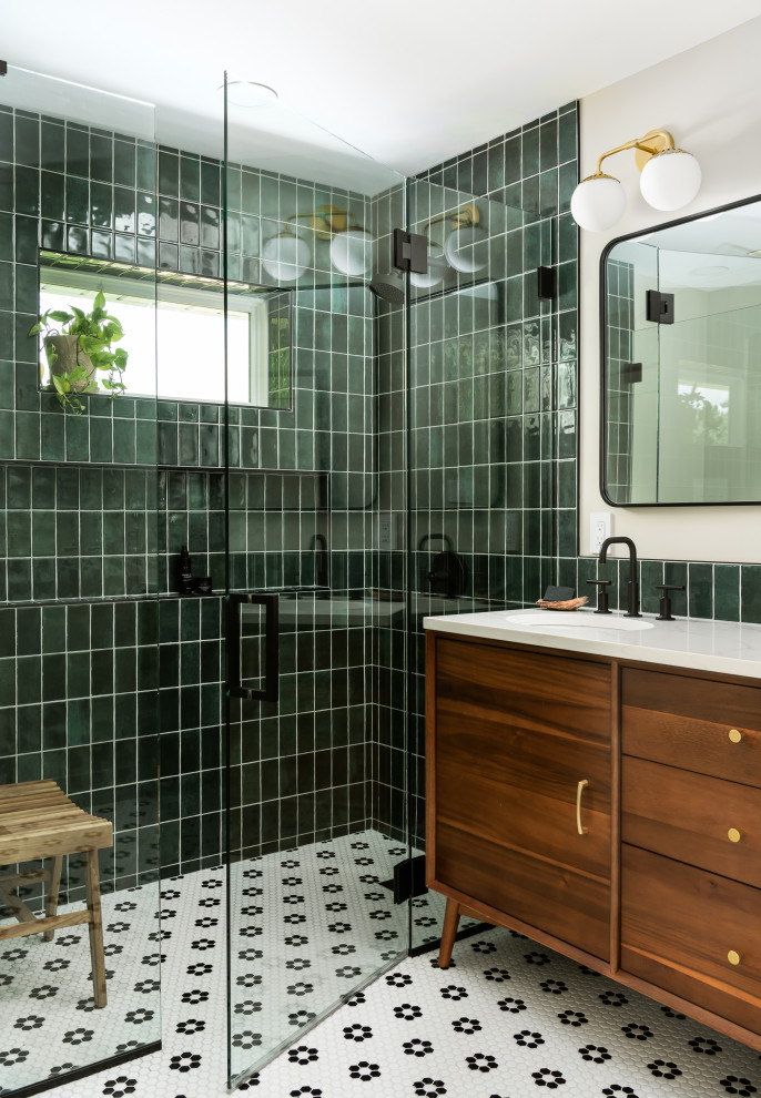 Design ideas for a mid-sized midcentury master bathroom in St Louis with flat-panel cabinets, medium wood cabinets, ceramic floors, multi-coloured floor, a curbless shower, a bidet, green tile, ceramic tile, white walls, an undermount sink, engineered quartz benchtops, a hinged shower door, white benchtops, a niche, a double vanity and a freestanding vanity.