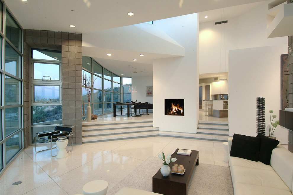 Inspiration for a large contemporary open concept living room in Phoenix with white walls.