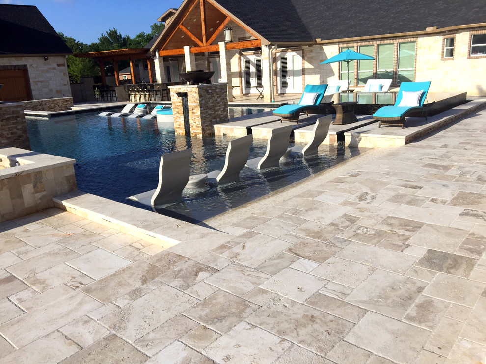 Mid-sized transitional backyard custom-shaped lap pool in Orlando with a hot tub and tile.