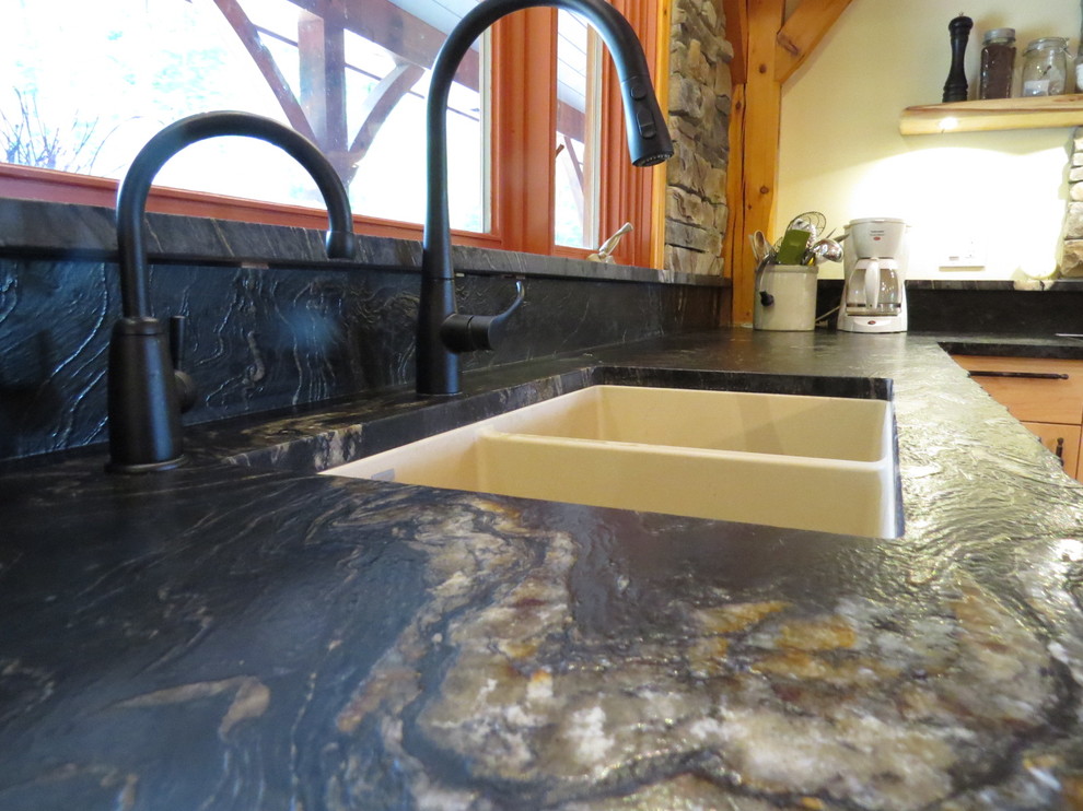 Large u-shaped eat-in kitchen photo in Toronto with shaker cabinets, granite countertops, stone tile backsplash and an island
