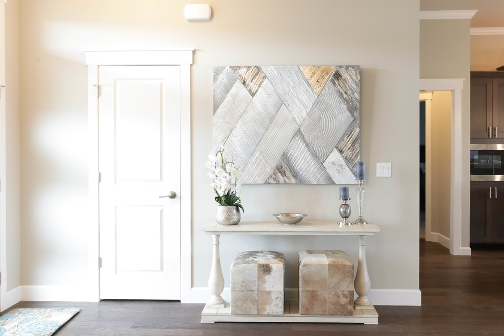 Front door - small transitional medium tone wood floor and brown floor front door idea in Seattle with gray walls and a white front door