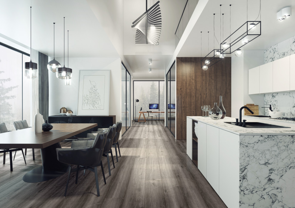 This is an example of a traditional galley kitchen/diner in Los Angeles with a built-in sink, flat-panel cabinets, white cabinets, marble worktops, grey splashback, marble splashback, black appliances, dark hardwood flooring, an island, brown floors and white worktops.
