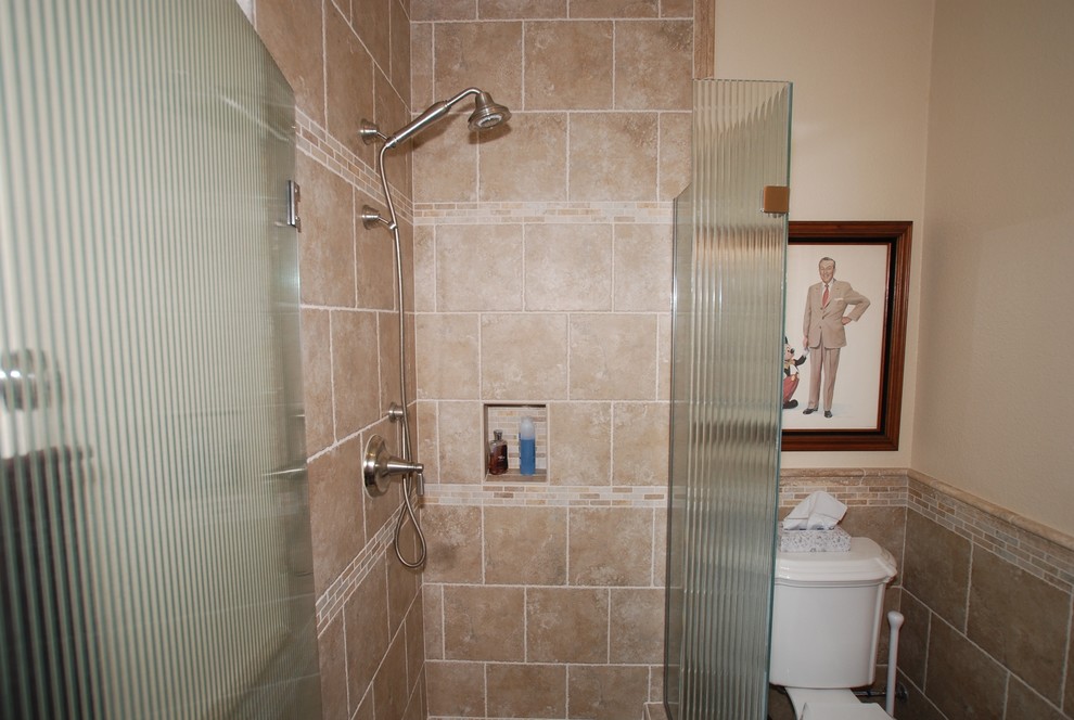 Example of a small minimalist 3/4 beige tile and porcelain tile porcelain tile corner shower design in Orange County with an undermount sink, raised-panel cabinets, dark wood cabinets, granite countertops, a two-piece toilet and beige walls