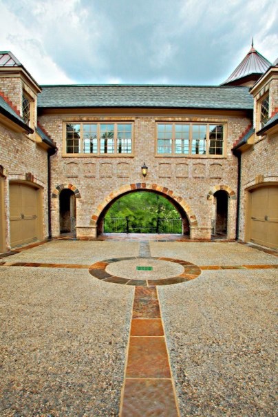 Photo of a large traditional attached two-car porte cochere in Atlanta.