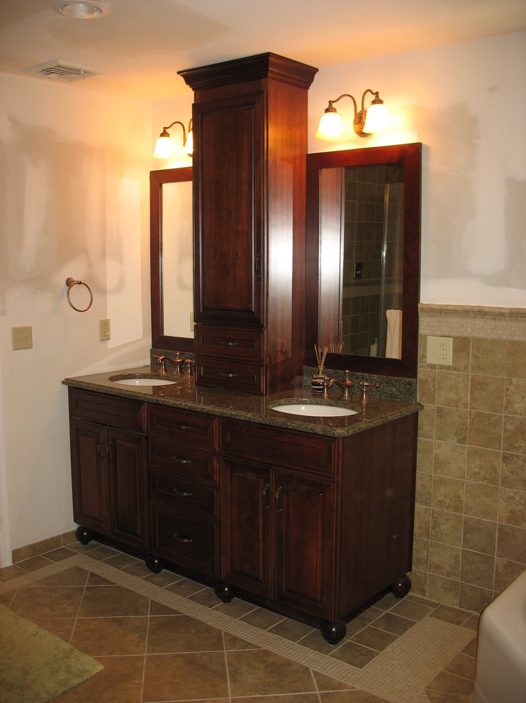 This is an example of a transitional master bathroom in New York.
