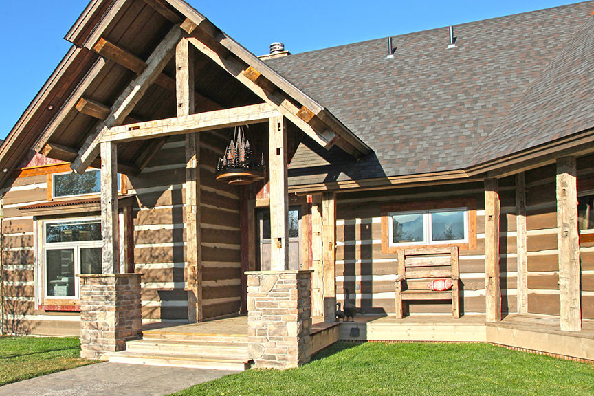Inspiration for a rustic multicolored wood exterior home remodel