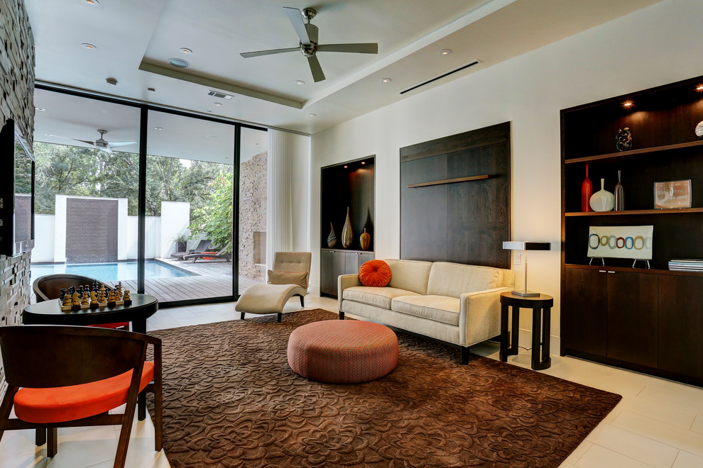 Large contemporary formal open concept living room in Houston with beige walls, porcelain floors, a wall-mounted tv and no fireplace.