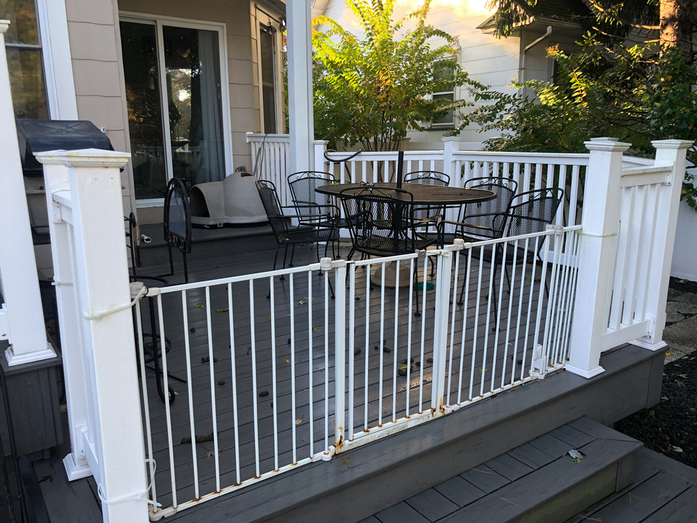 Mid-sized elegant backyard deck photo in Newark with no cover