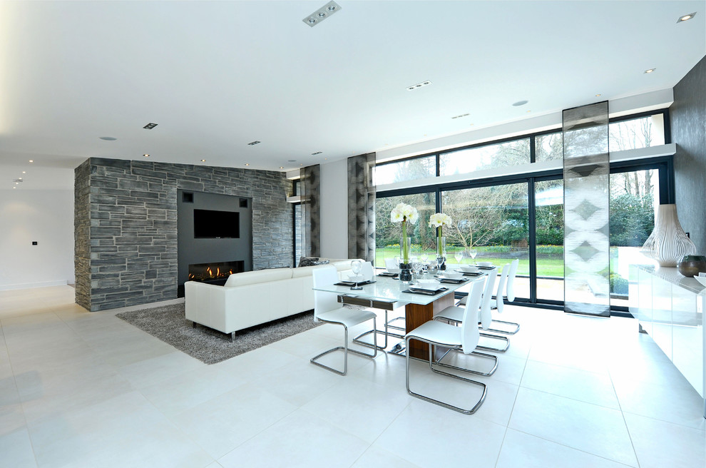 This is an example of a contemporary dining room in Dorset.