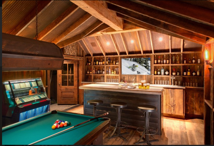 Inspiration for a traditional home bar in Denver.