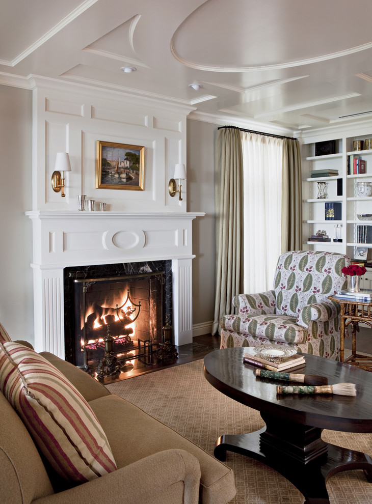 Photo of a traditional living room in Los Angeles with white walls and a standard fireplace.