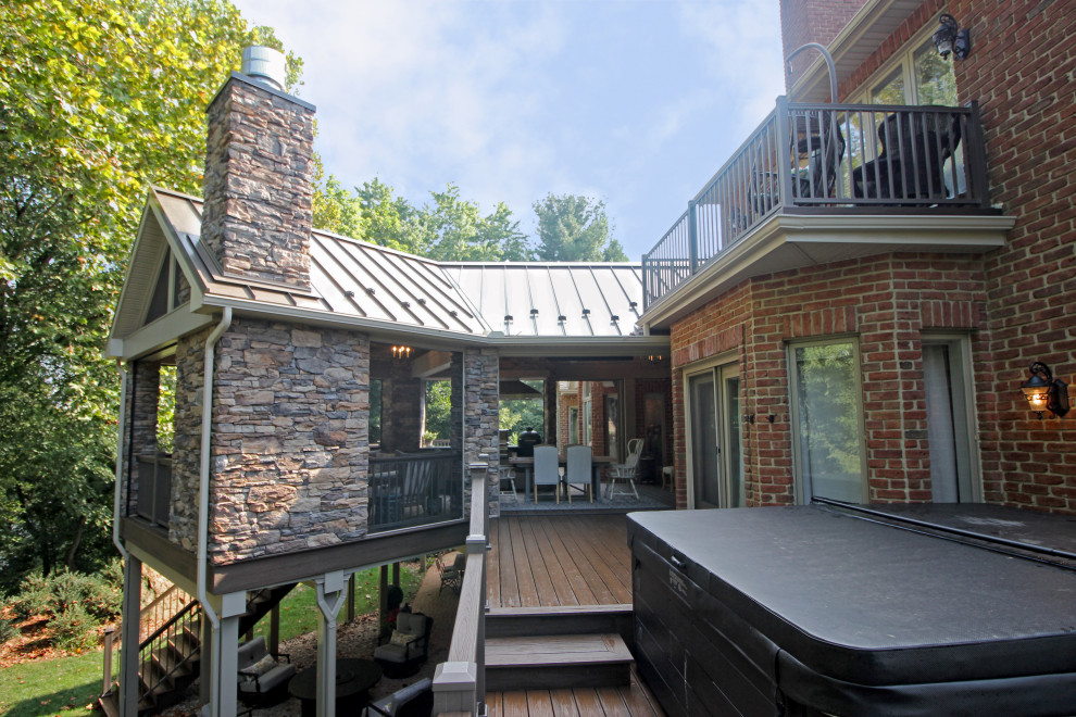 Inspiration for a transitional backyard second story metal railing deck remodel