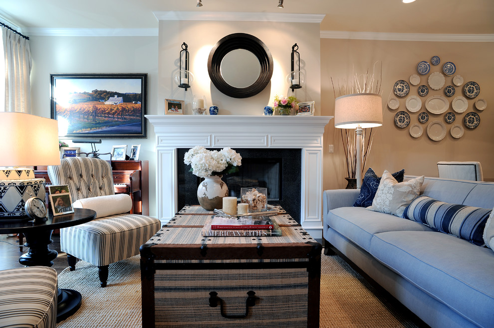 Design ideas for a traditional living room in Chicago with beige walls and a standard fireplace.