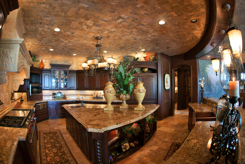 Inspiration for an eat-in kitchen remodel in Houston with a farmhouse sink, recessed-panel cabinets, dark wood cabinets, granite countertops, beige backsplash, custom tile backsplash and paneled appliances