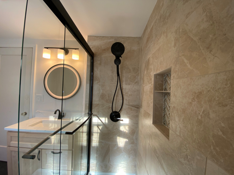 Bathroom - mid-sized modern 3/4 ceramic tile, black floor and single-sink bathroom idea in New York with beige cabinets, a one-piece toilet, white walls, an integrated sink, a niche and a built-in vanity