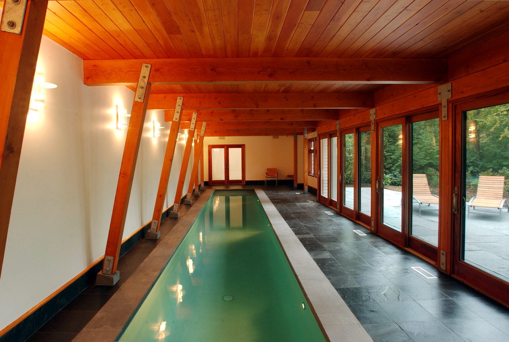 Design ideas for a large contemporary swimming pool in Boston.