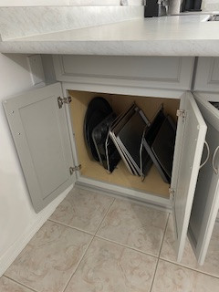 Large u-shaped eat-in kitchen photo with flat-panel cabinets, gray cabinets, laminate countertops and a peninsula