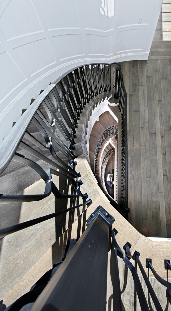 Example of a transitional staircase design in Orange County
