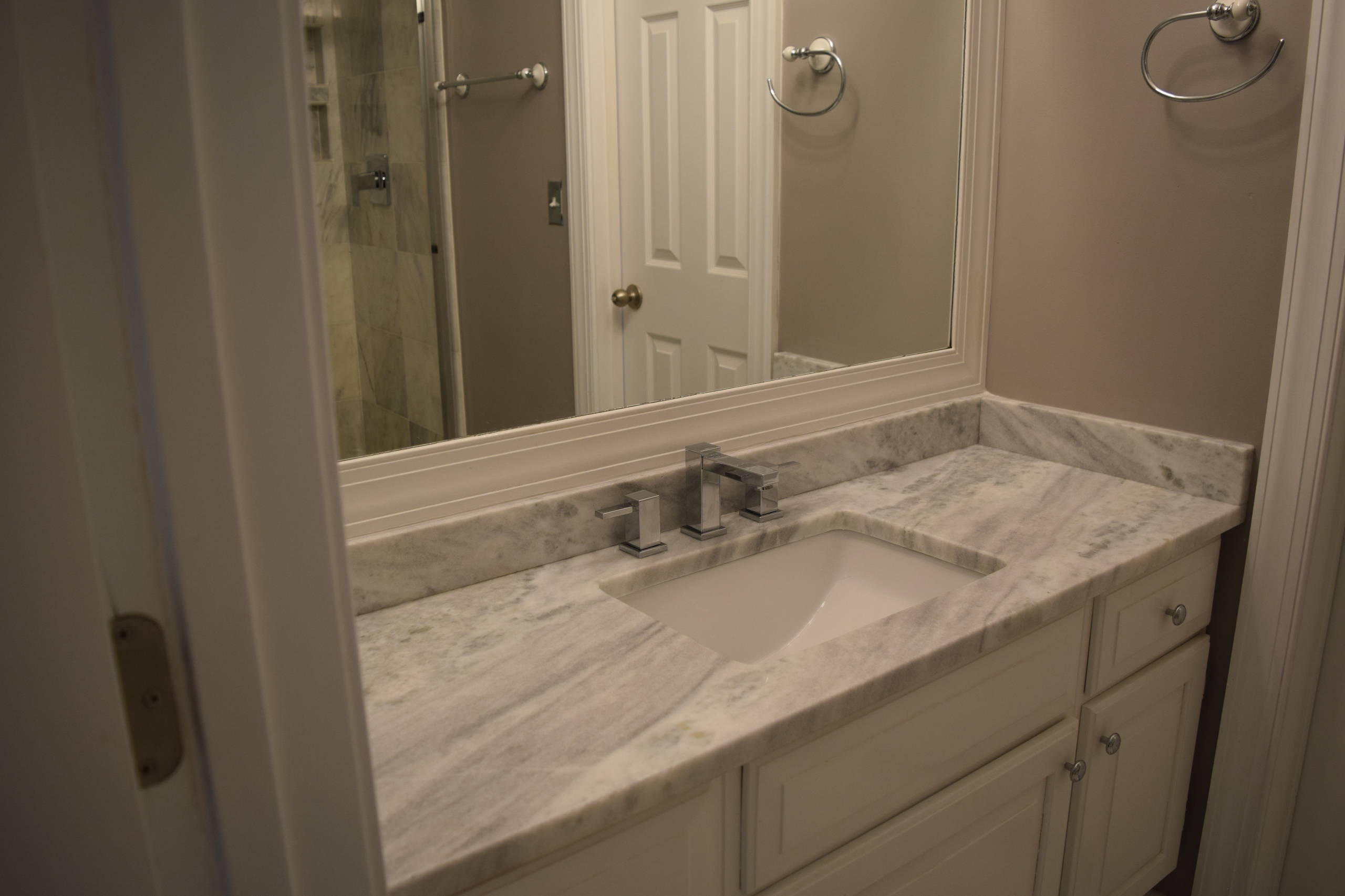 Traditional white Marble bath with Shadow Storm Granite!