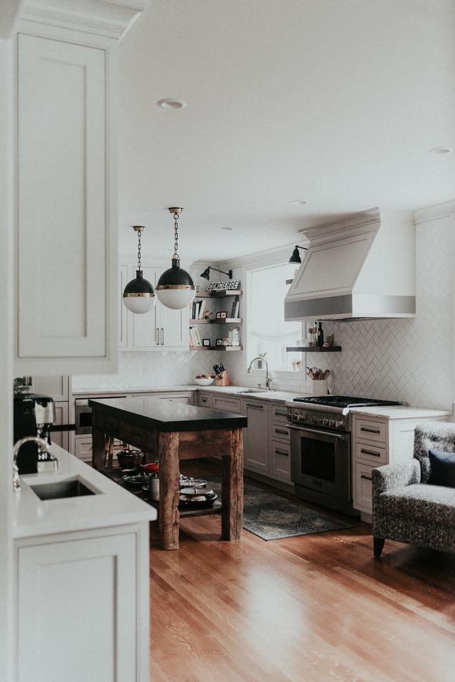 Example of a transitional kitchen design in Cleveland