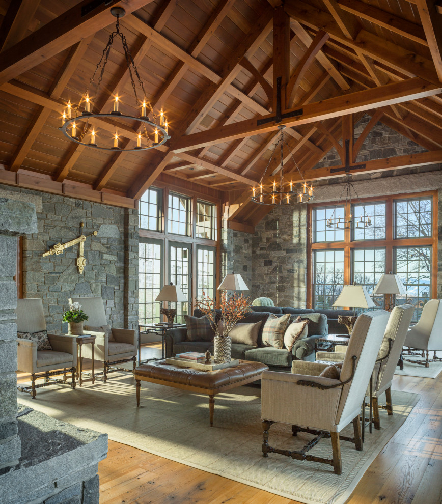 Design ideas for an expansive arts and crafts formal open concept living room in Boston with a stone fireplace surround.