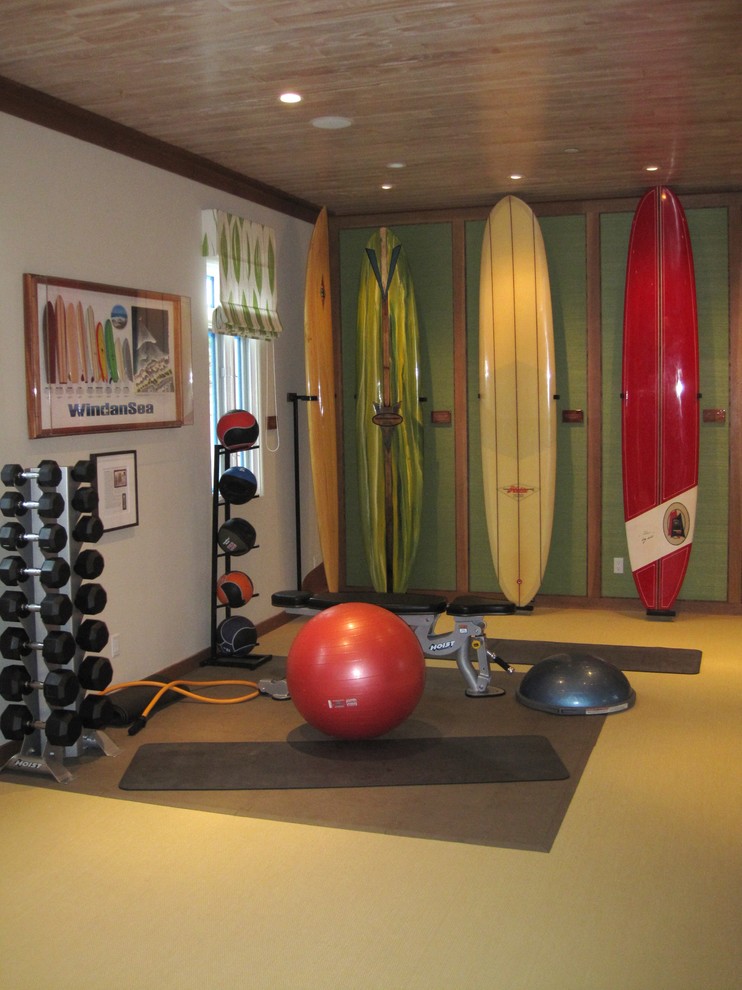 Inspiration for a beach style home gym in Orange County with green walls.