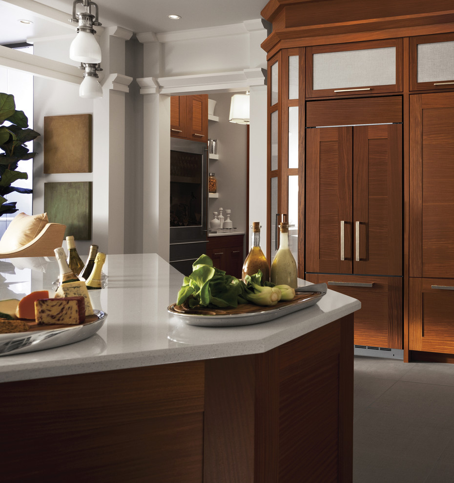 Example of a mid-sized transitional l-shaped porcelain tile and beige floor open concept kitchen design with stainless steel appliances, shaker cabinets, dark wood cabinets, quartz countertops and an island
