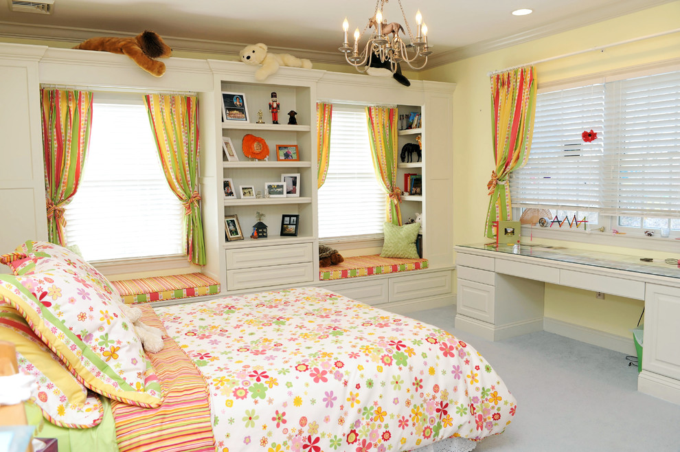 This is an example of a mid-sized traditional kids' room for girls in Philadelphia with yellow walls and carpet.