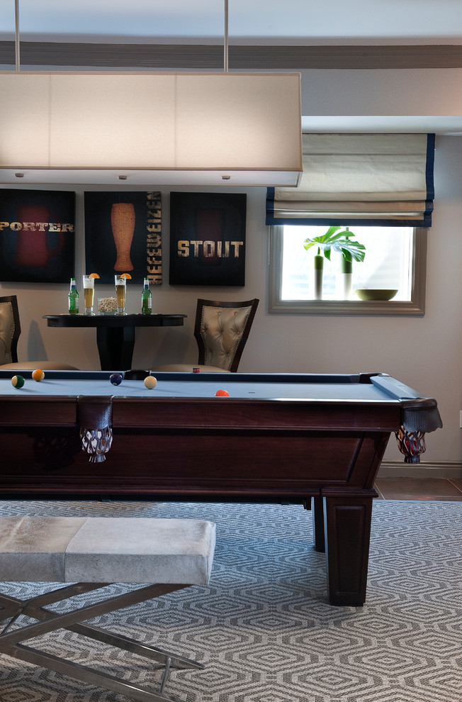 Classic Contemporary Billiard Room - A classic, elegant master suite for the husband and wife, and a fun, sophisticated entertainment space for their family -- it was a dream project!

To turn the master suite into a luxury retreat for two young executives, we mixed rich textures with a playful, yet regal color palette of purples, grays, yellows and ivories. 

For fun family gatherings, where both children and adults are encouraged to play, I envisioned a handsome billiard room and bar, inspired by the husband’s favorite pub.
