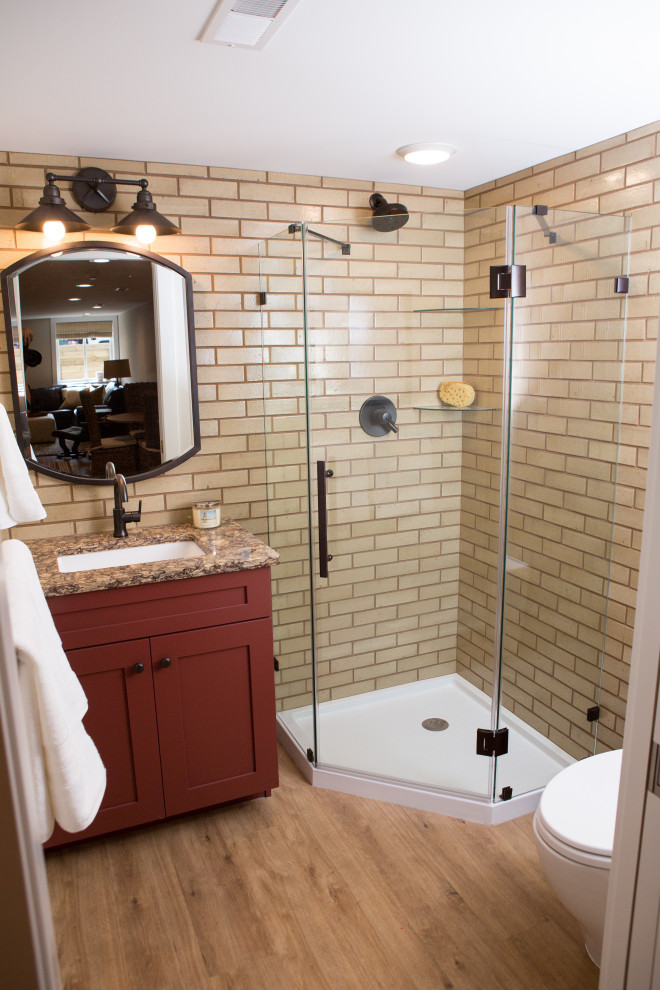 Inspiration for a small 3/4 bathroom in Other with shaker cabinets, red cabinets, a corner shower, a one-piece toilet, beige tile, ceramic tile, beige walls, vinyl floors, an undermount sink, engineered quartz benchtops, beige floor, a hinged shower door, beige benchtops, a single vanity and a built-in vanity.