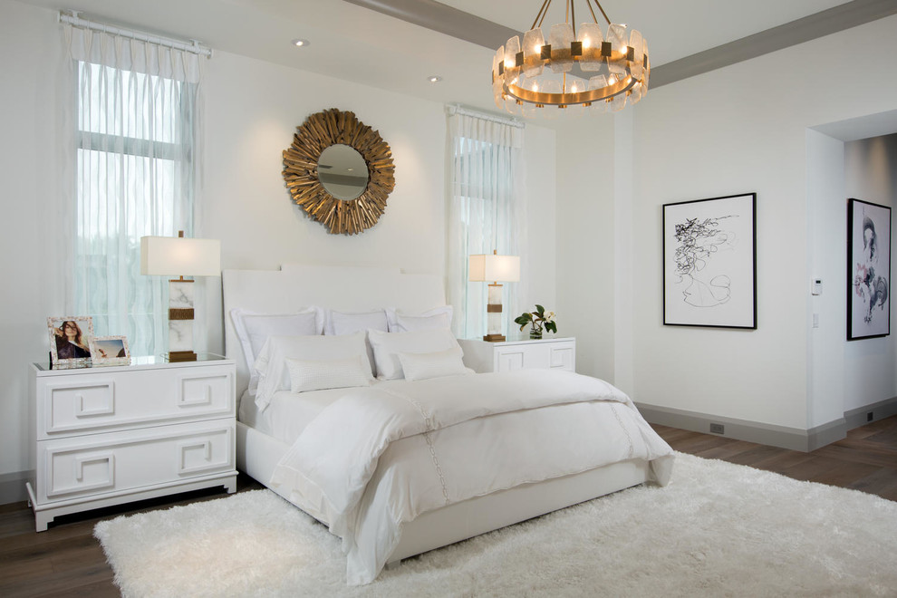 Inspiration for a transitional master bedroom in Miami with white walls, dark hardwood floors and brown floor.