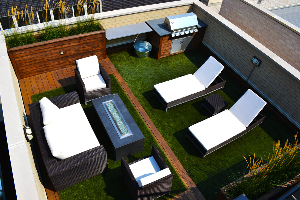Mid-sized trendy rooftop deck photo in Chicago with a fire pit, decking and no cover