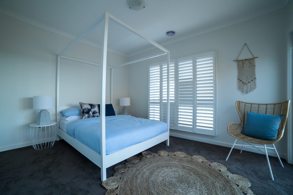 Photo of a transitional bedroom in Melbourne.