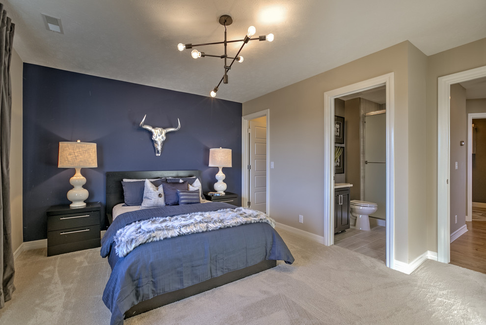 This is an example of a large transitional master bedroom in Omaha with beige walls, carpet, no fireplace and beige floor.