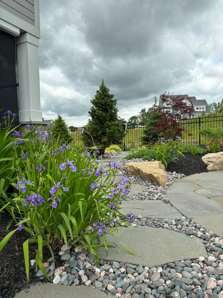 Design ideas for a huge transitional backyard landscaping.