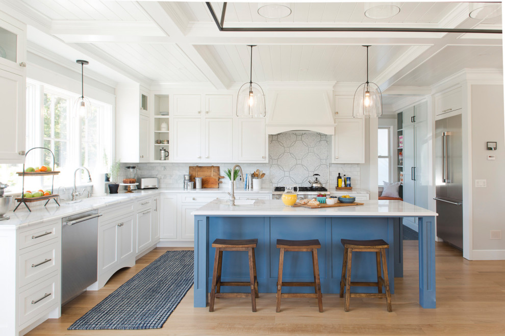 This is an example of a beach style kitchen in Providence with with island.