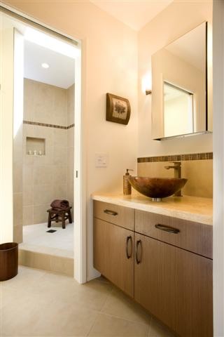 Design ideas for a small contemporary 3/4 bathroom in San Francisco with a vessel sink, flat-panel cabinets, medium wood cabinets, engineered quartz benchtops, a freestanding tub, an open shower, a two-piece toilet, multi-coloured tile, porcelain tile, white walls and porcelain floors.