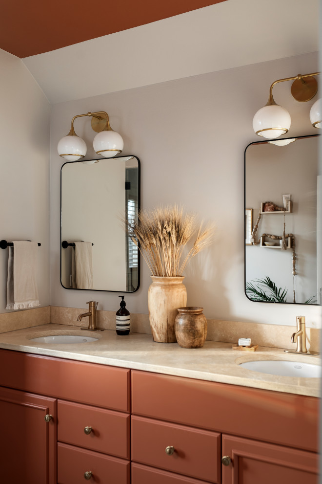 Design ideas for a mid-sized transitional master bathroom in Chicago with recessed-panel cabinets, green cabinets, dark hardwood floors, a two-piece toilet, grey walls, an undermount sink, limestone benchtops, beige floor, beige benchtops, a double vanity and a built-in vanity.