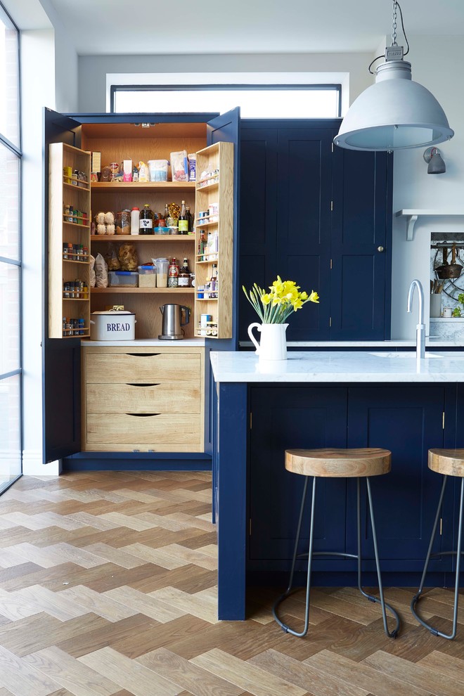 design ideas for a traditional kitchen pantry in london.