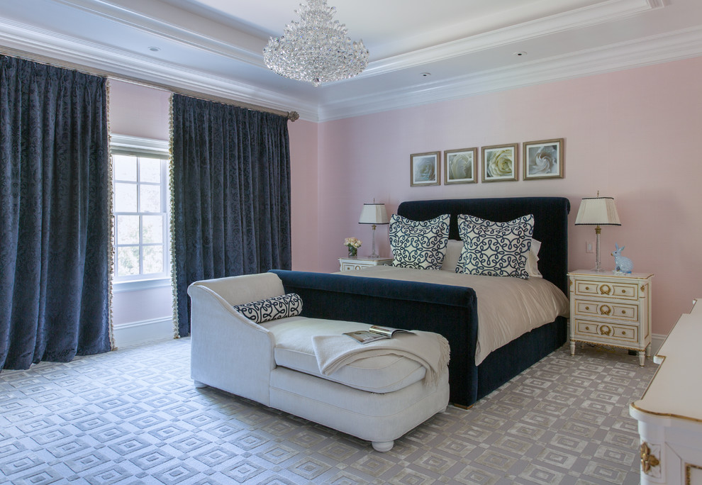 This is an example of a large traditional master bedroom in Boston with pink walls, carpet and grey floor.